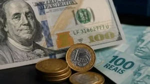 Dólar cai a R$ 5,10 e Ibovespa recua após Copom cortar Selic para 14%